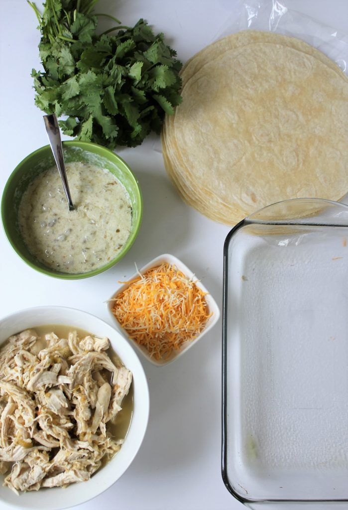 Green Chile Chicken Burritos - made with 5 ingredients including Greek yogurt. Can be gluten free and dairy free. #chickenburritos #greenchilechicken #healthymealprep