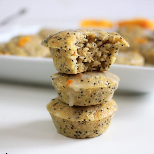 Stack of gluten free orange poppyseed muffins