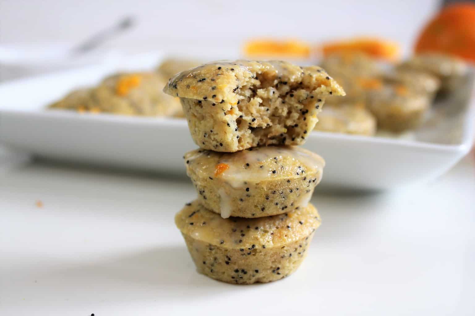 Stack of gluten free orange poppyseed muffins