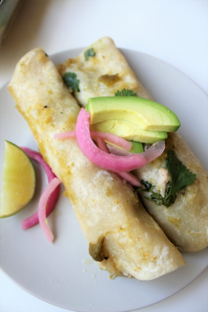 2Dairy Free Chicken Enchiladas on a plate