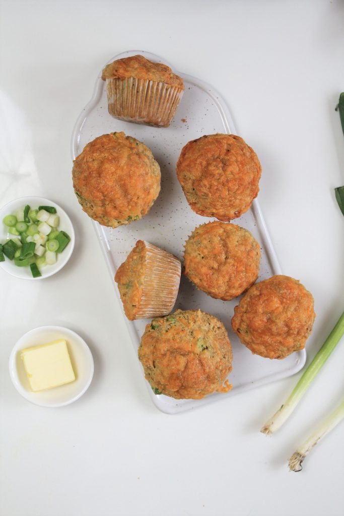 Savory Cheddar Muffins with scallions and butter. A delicious savory breakfast! 