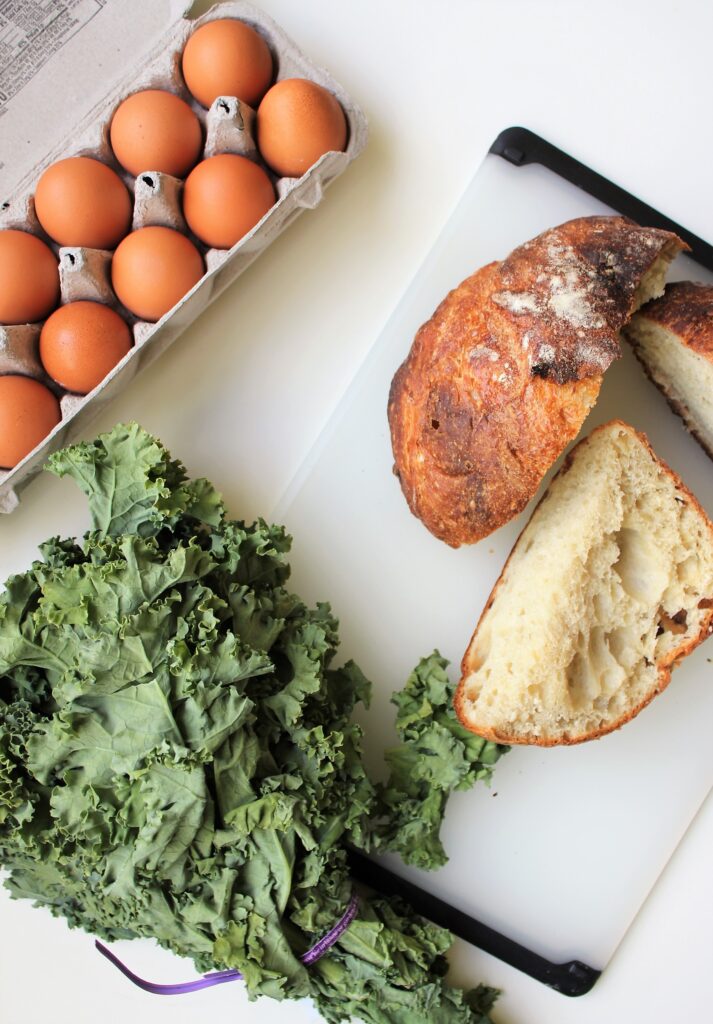 Mise En place of leftover homemade bread, kale, and eggs